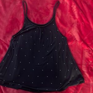 Gap size XS spaghetti strap top with little tiny whit flowers.